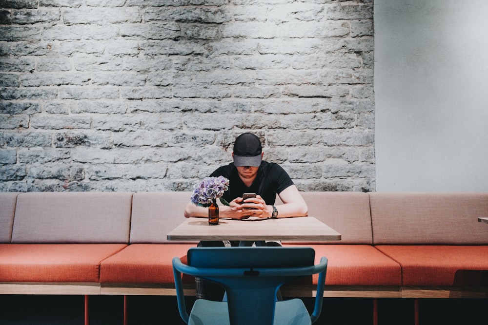 man looking at his cellphone