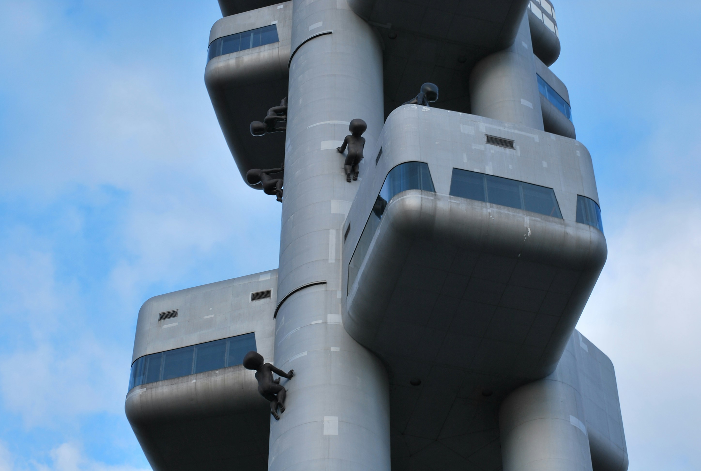 Large military radar installation with protective dome structure against cloudy sky