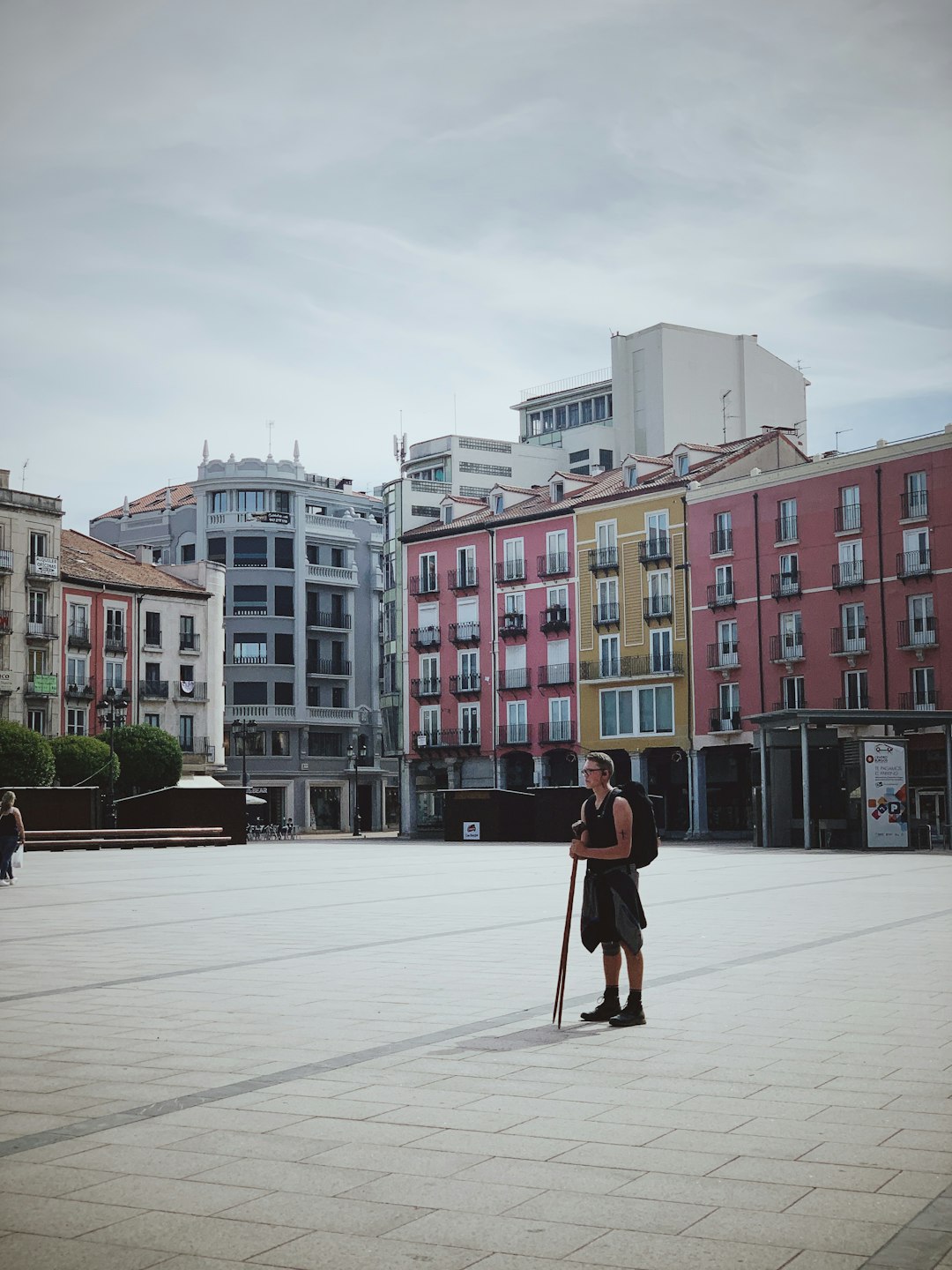 man standing near building