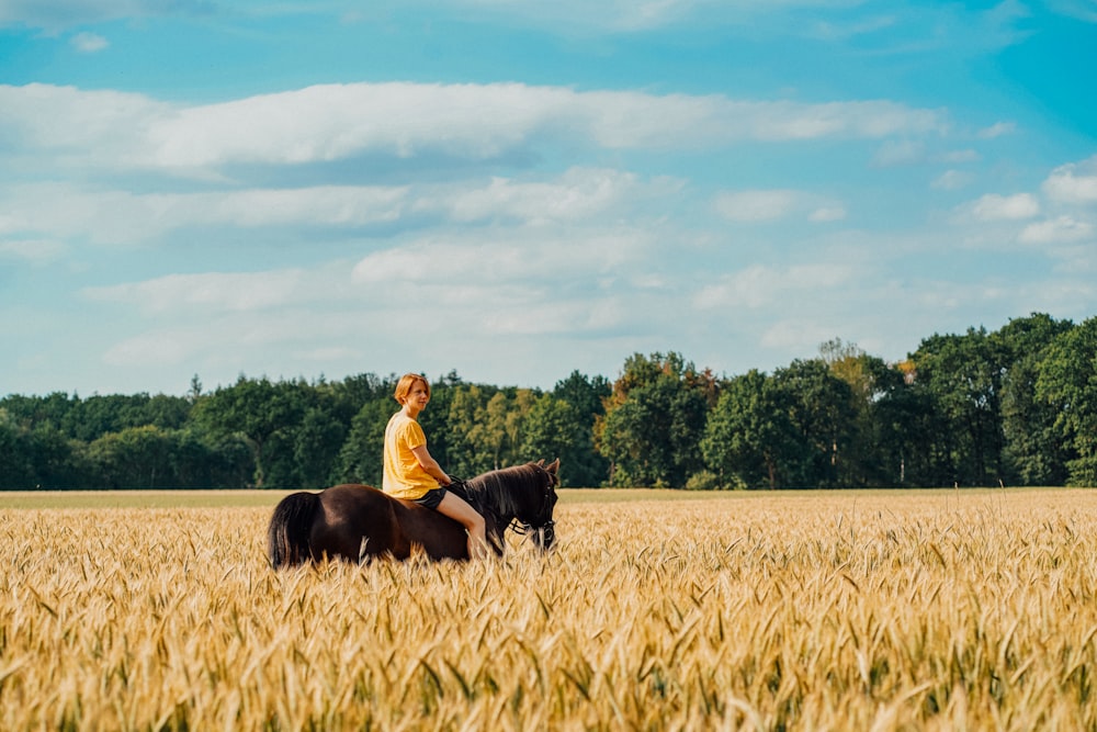 woman riding on horse