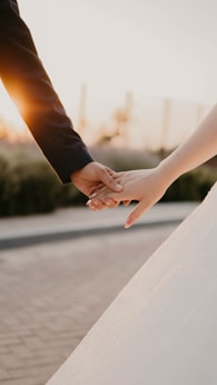 man and woman hands holding