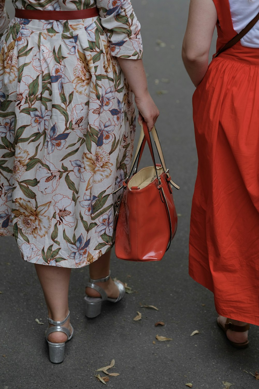 two women's red and white dresses