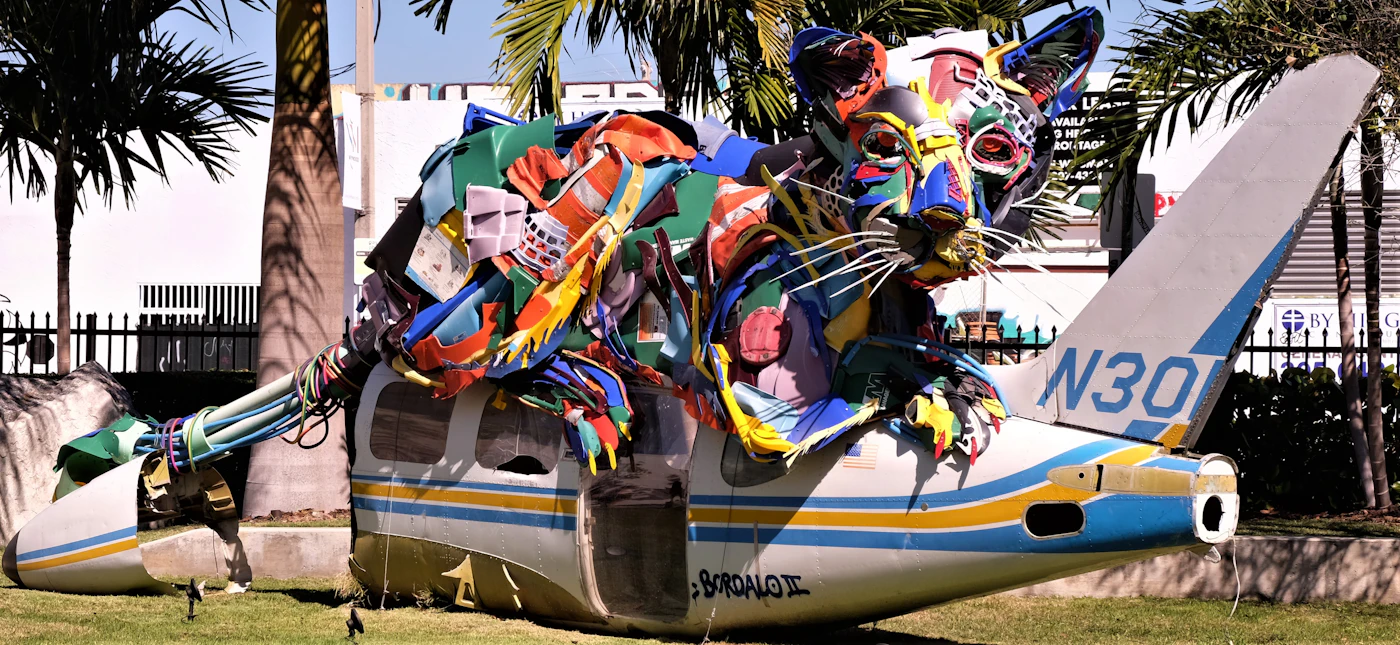 A colorful animal sculpture built from salvaged materials, part of Miami’s street-art scene.