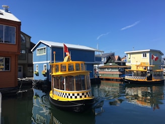 yellow and black canoe boat
