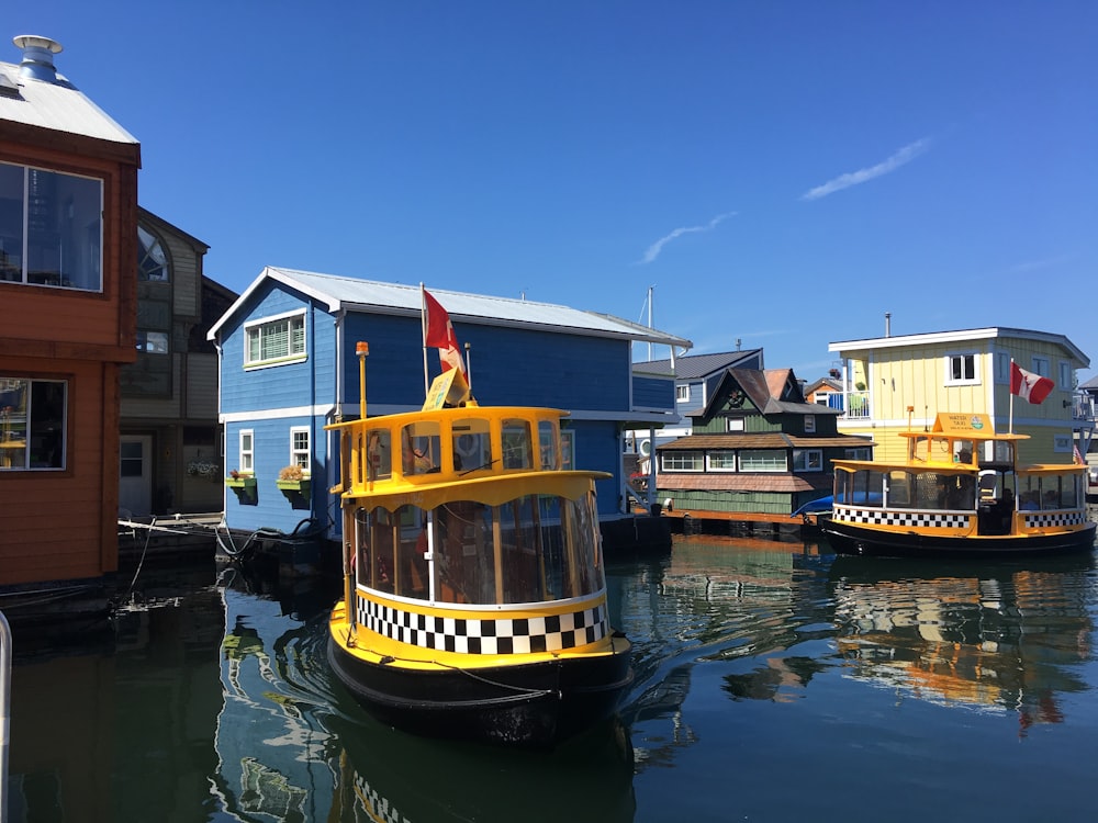 yellow and black canoe boat