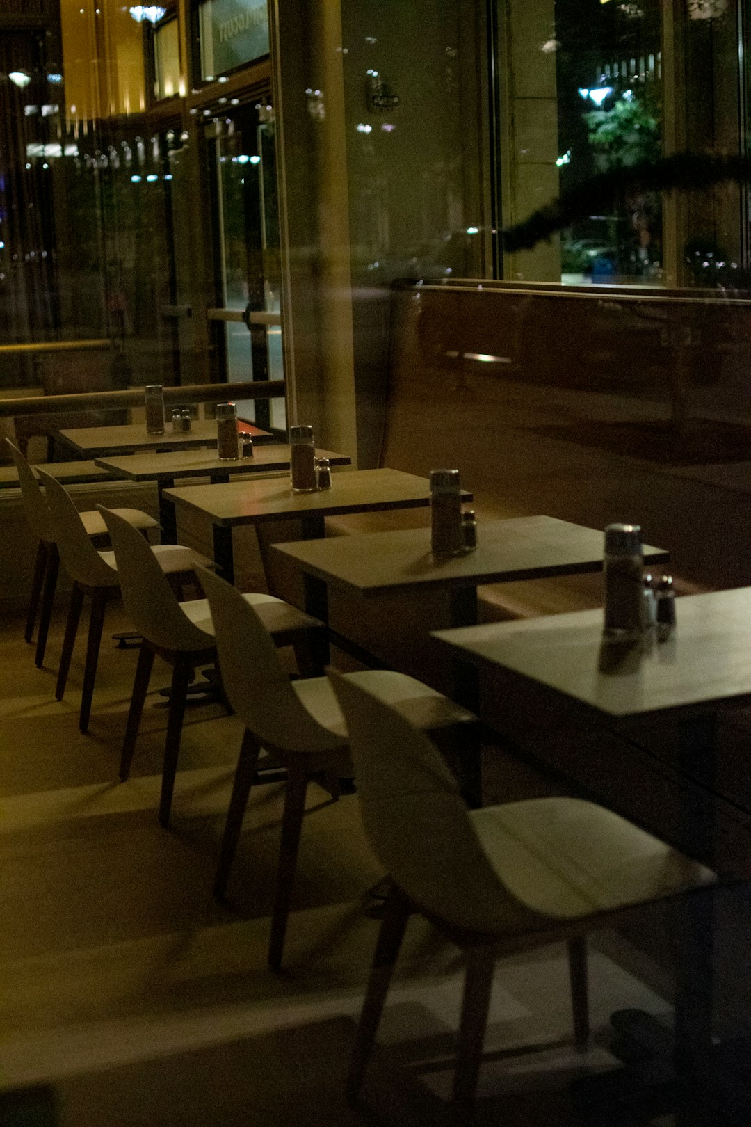 empty brown wooden chairs and tables