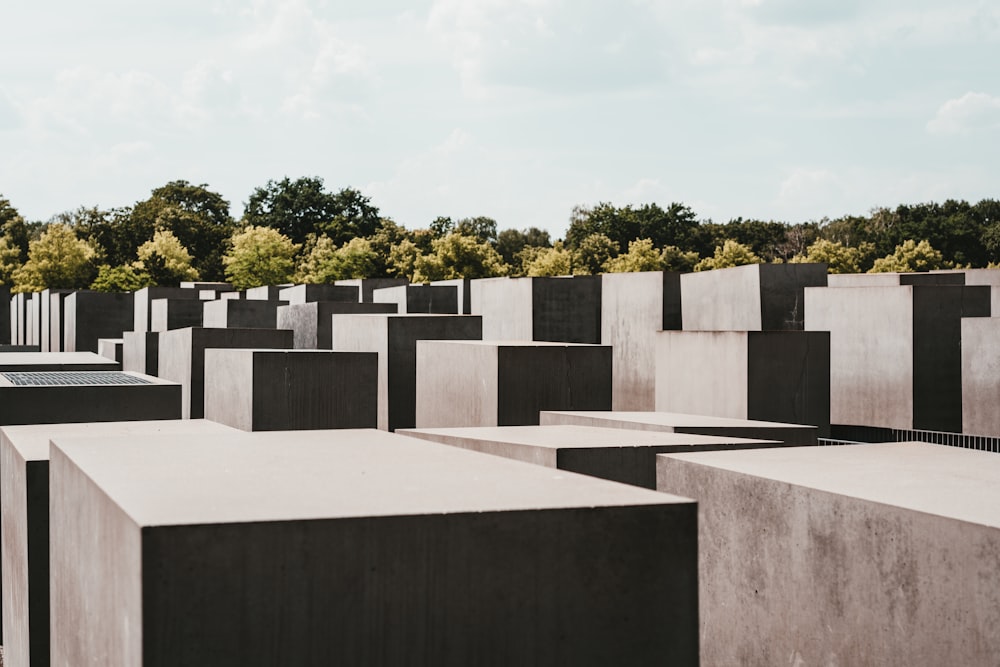 gray concrete structure near trees