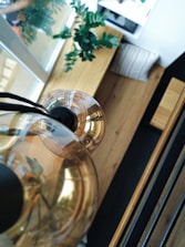 A modern LED flush mount light in a cozy living room.