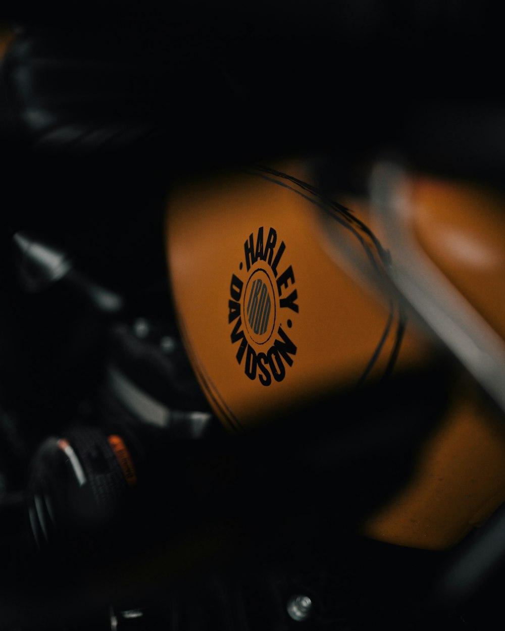 close photo of yellow Harley-Davidson motorcycle