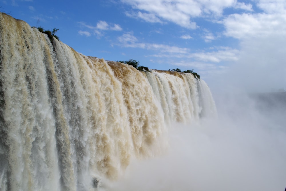 waterfall during daytime