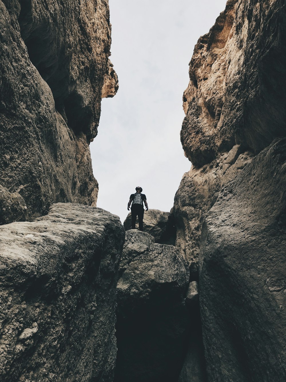 man standing on hill