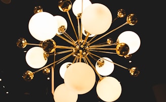 white and gold-colored chandelier