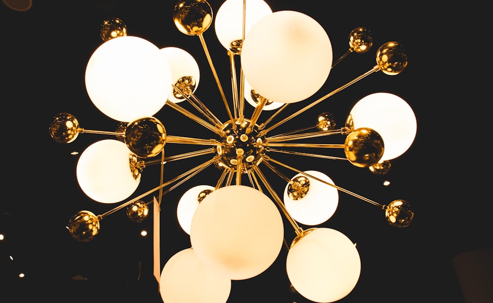 white and gold-colored chandelier