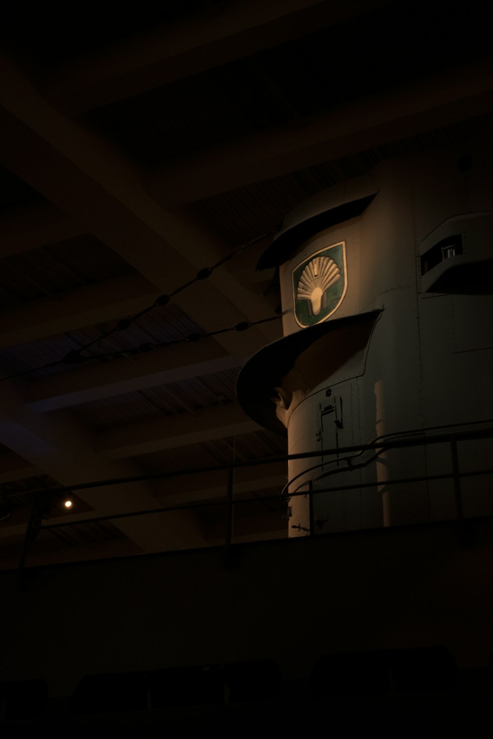 a clock on the side of a building at night