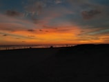 A breathtaking sunset over a picturesque beach.