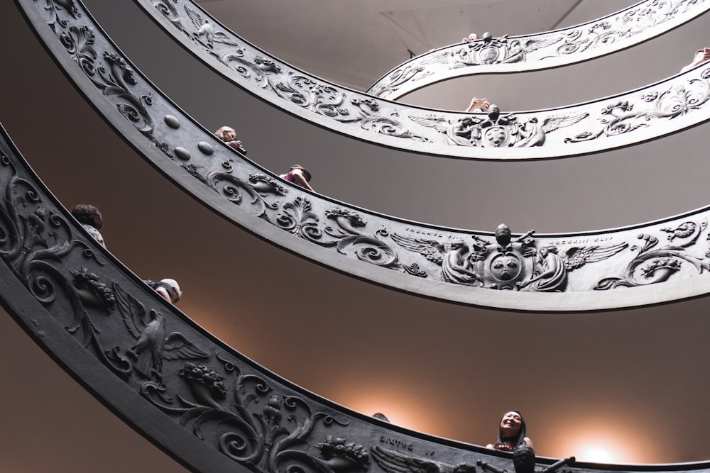 low-angle photography of spiral stairs