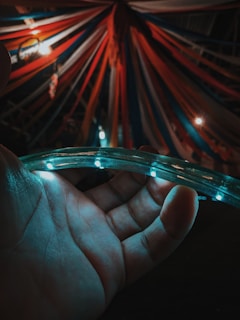 white LED rope light held by a hand