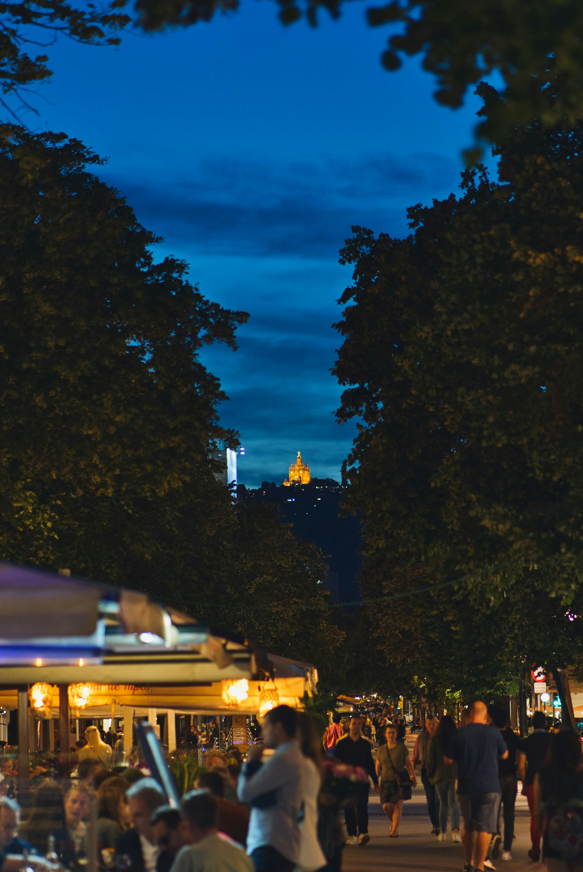 The historic Jabal Amman neighborhood glowing at dusk, with Mijana Restaurant’s inviting entrance bustling with diners.