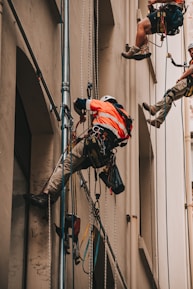 man wearing orange shirt