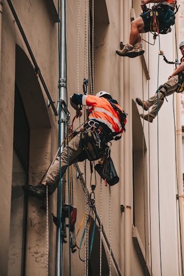man wearing orange shirt
