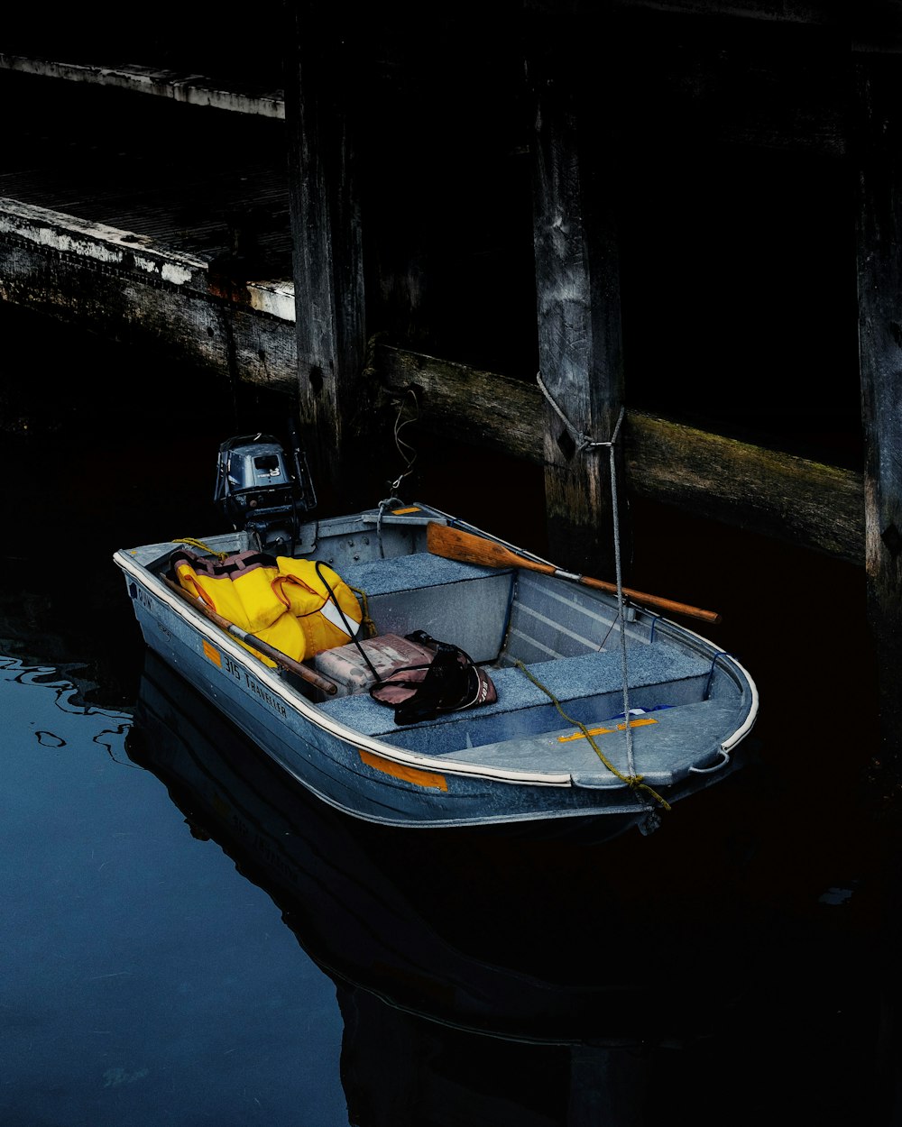 grey jon boat on water