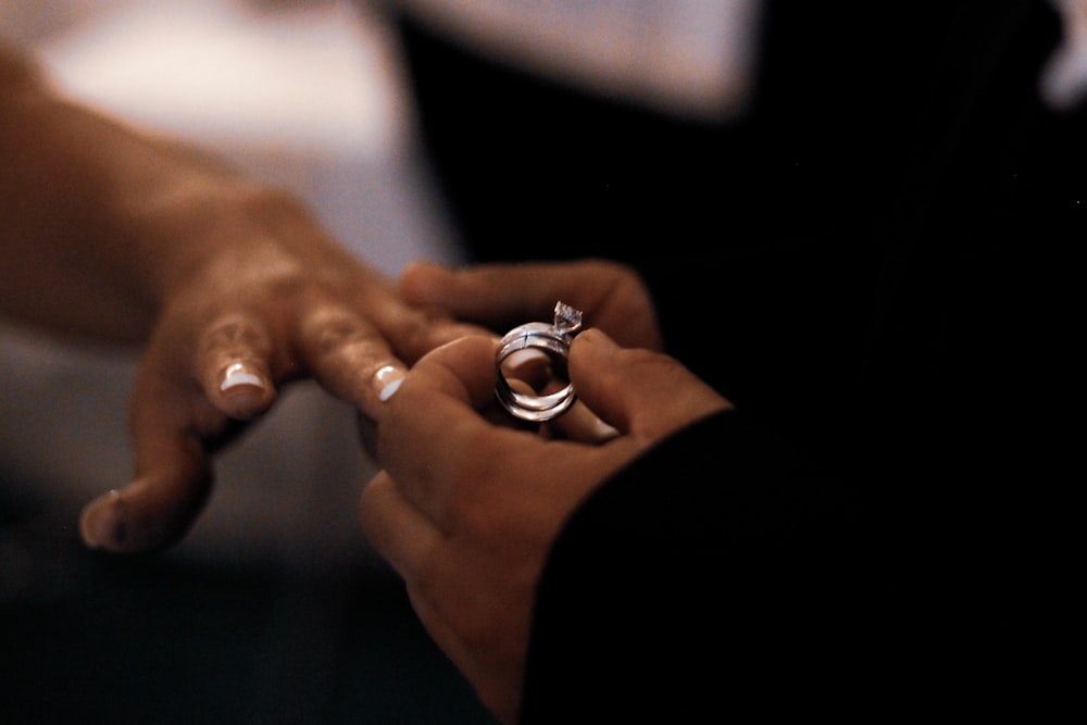 silver-colored ring