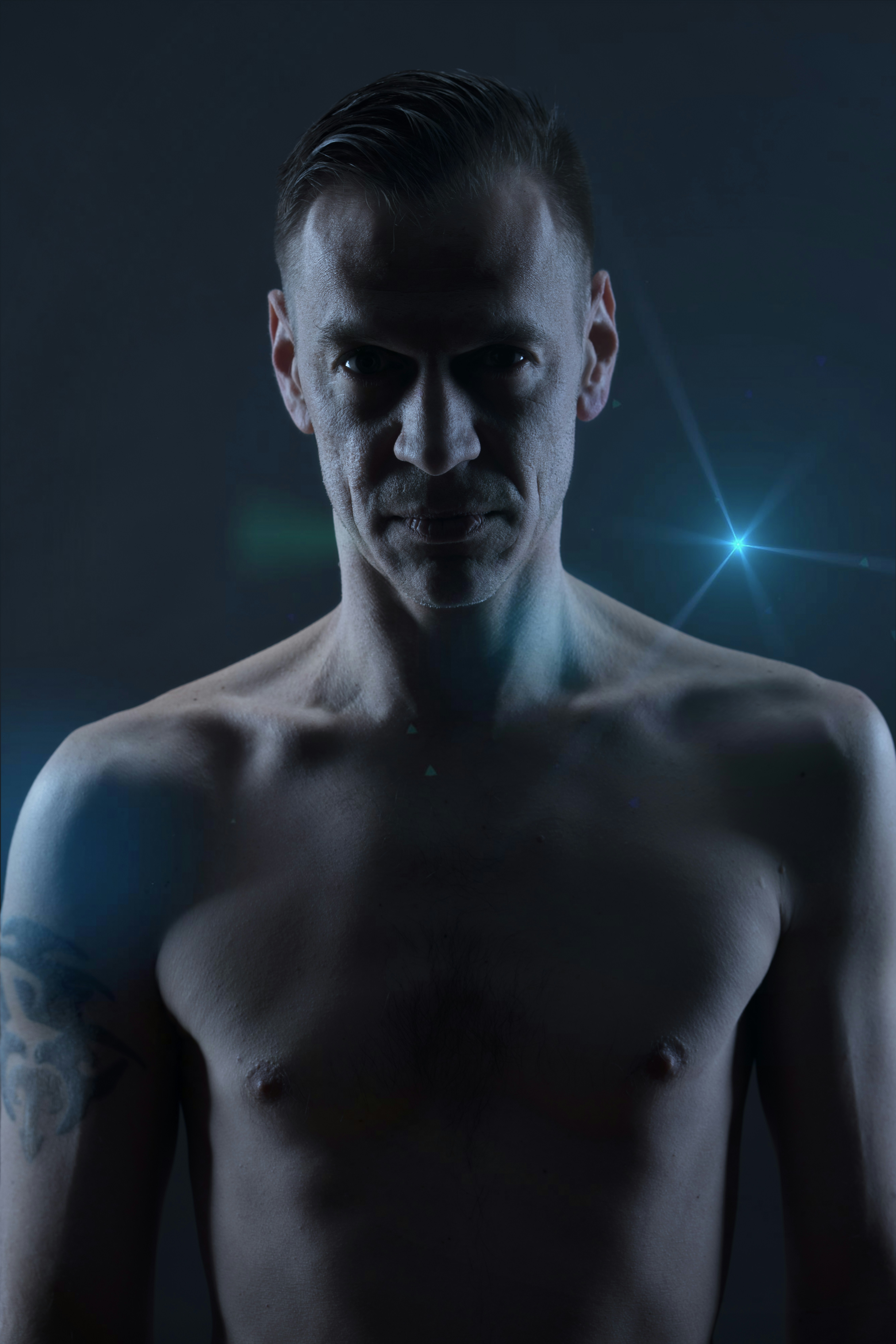 photo of topless man