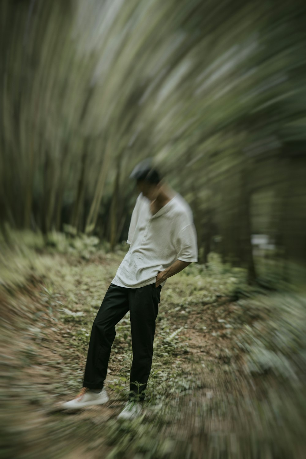 man walking along the forest