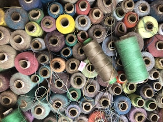 An assortment of colorful threads and yarns.