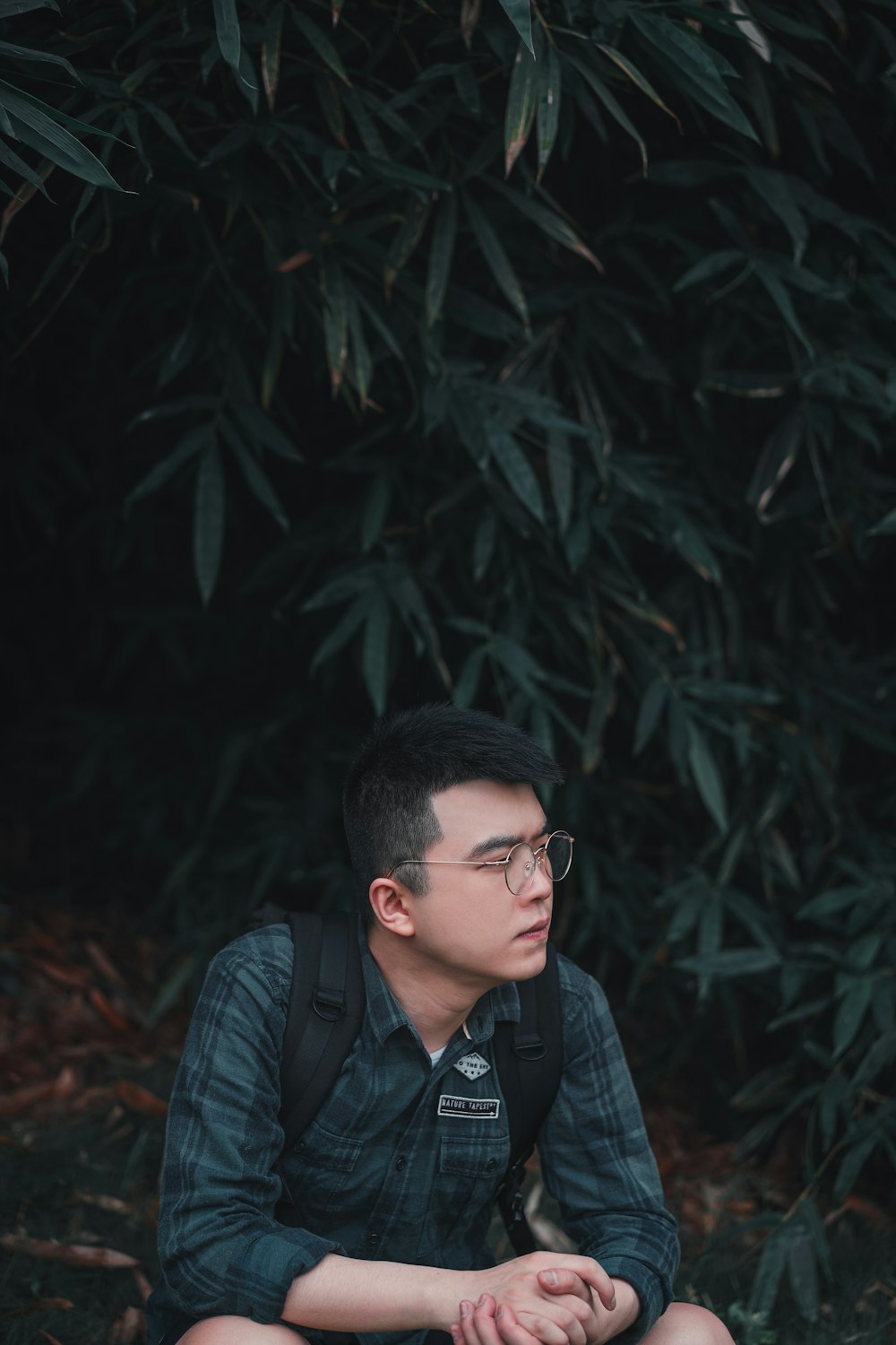 man wearing blue dress shirt