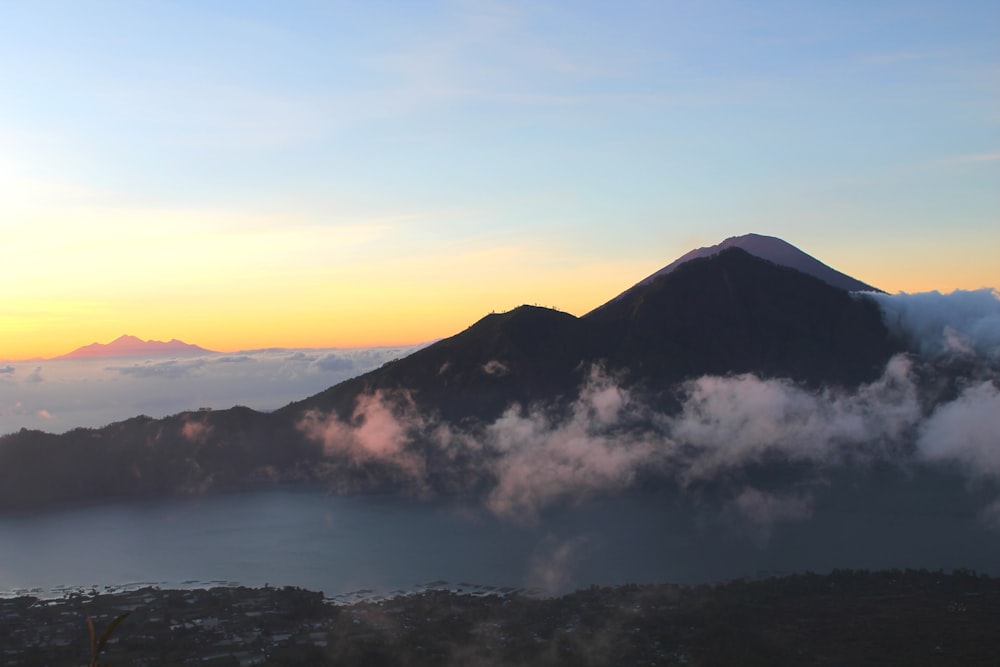 silhouette mountain during sunset