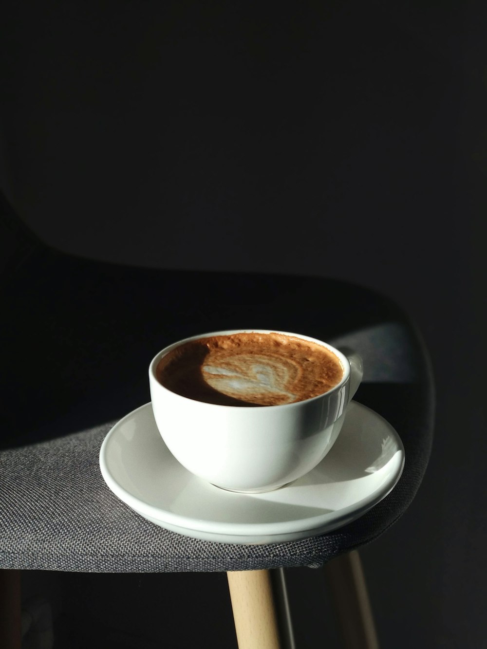 white ceramic teacup