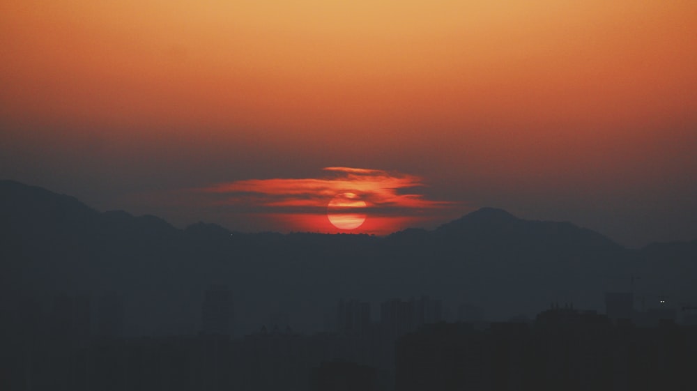 silhouette mountain during sunset