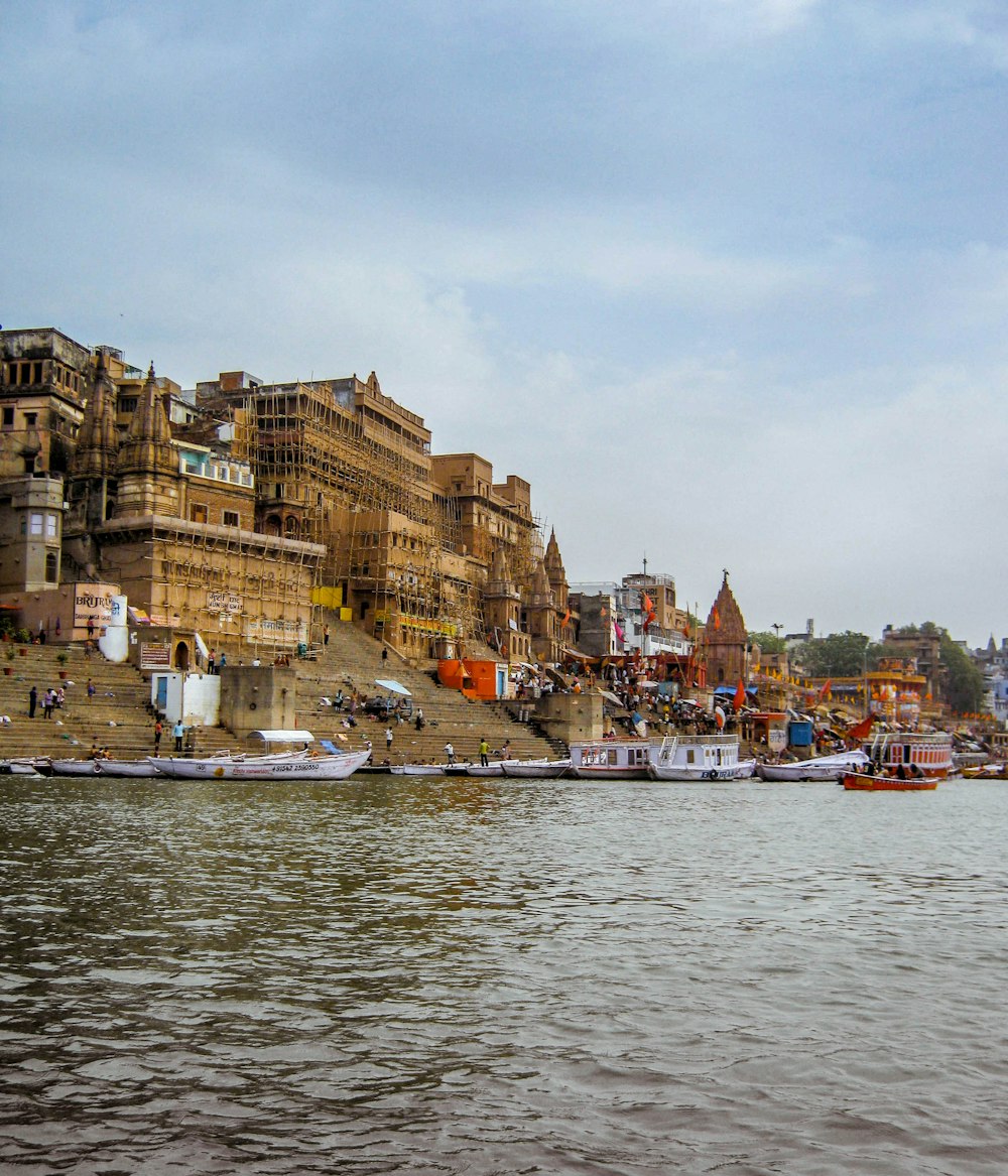 boat parked beside island with buildings