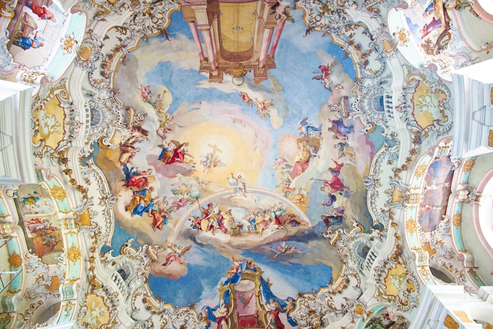 the ceiling of a church with a painting on it