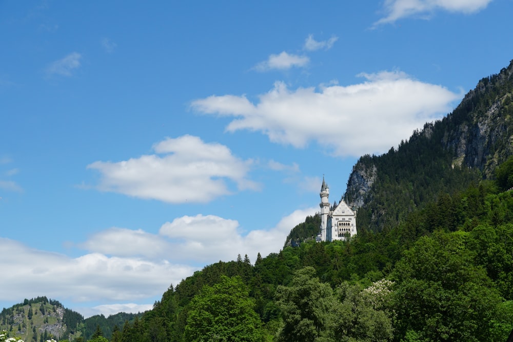 white building on top of mountain