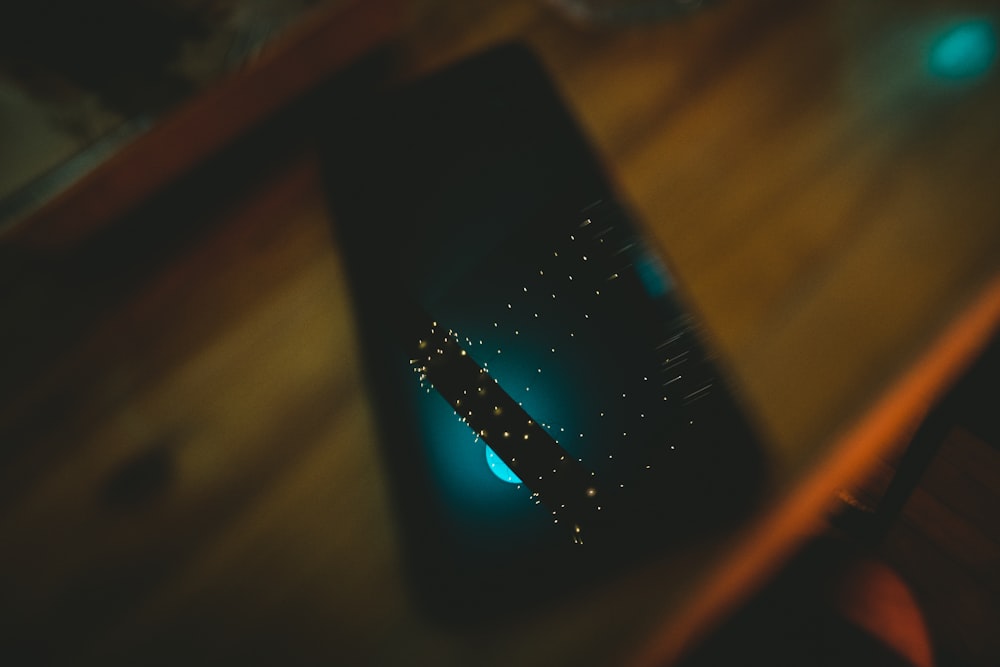 a close up of a cell phone on a table