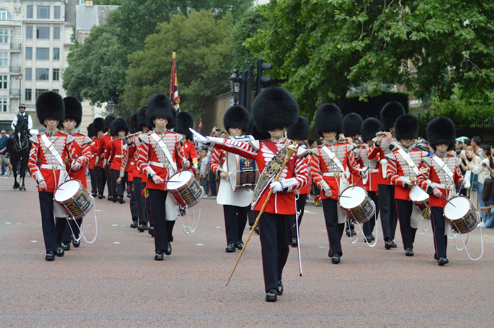 group of men marching on street