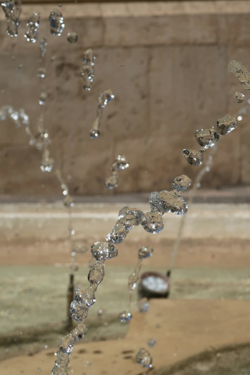 a sprinkle of water is coming out of a fire hydrant