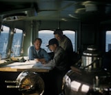 three men navigating