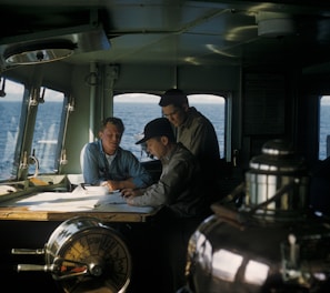 three men navigating