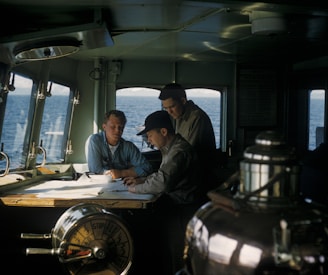 three men navigating