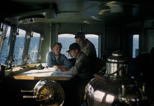 three men navigating