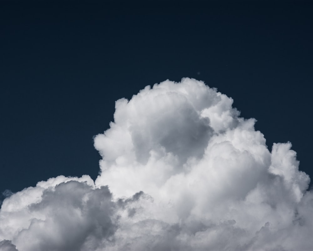 white clouds on blue sky