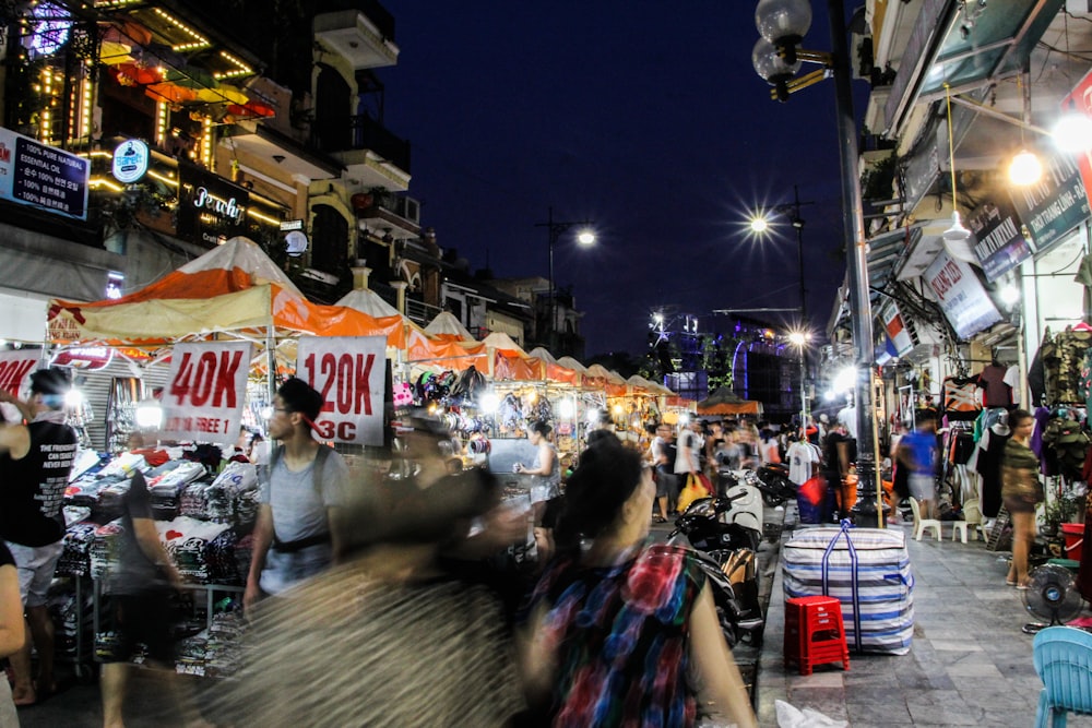 people on market at night