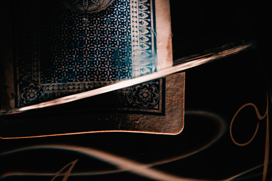 Close-up of a vibrant Charizard card glowing under soft light