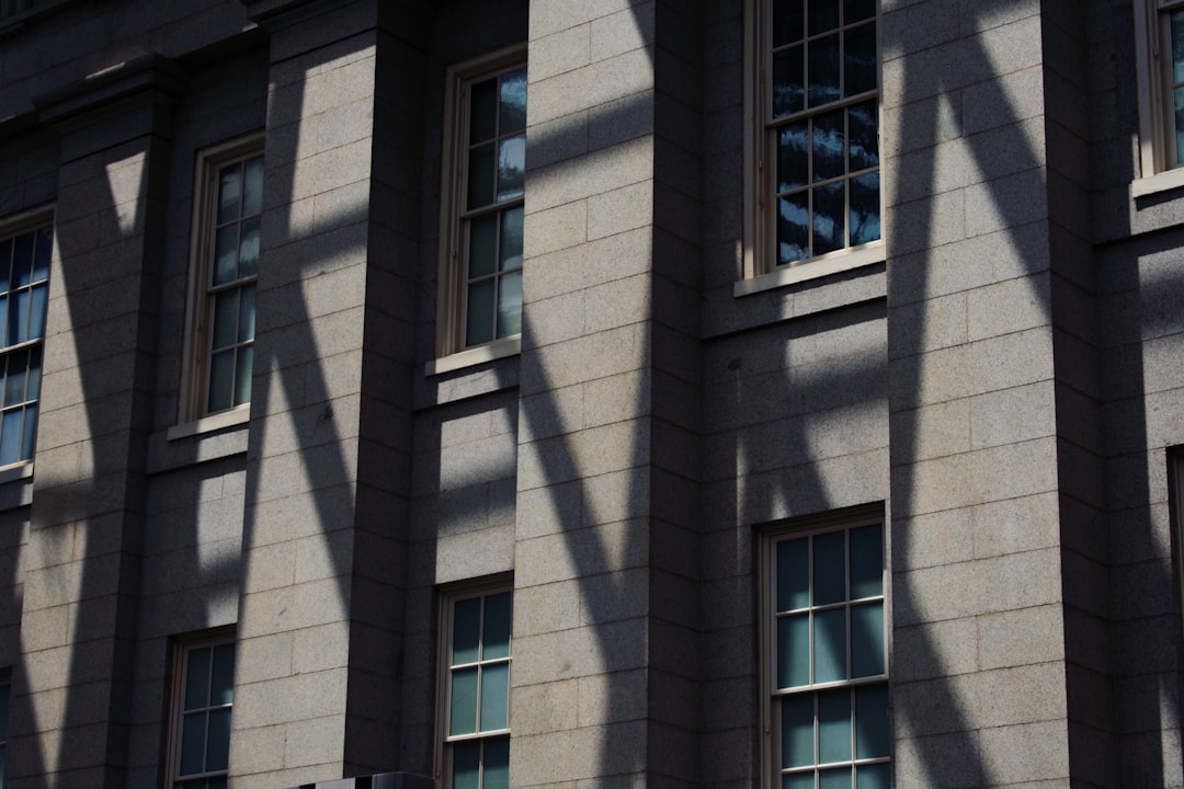 beams shadow on grey building