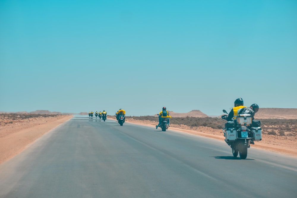 people riding motorcycle during daytime