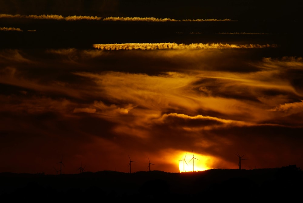 silhouette of towers during golden hour