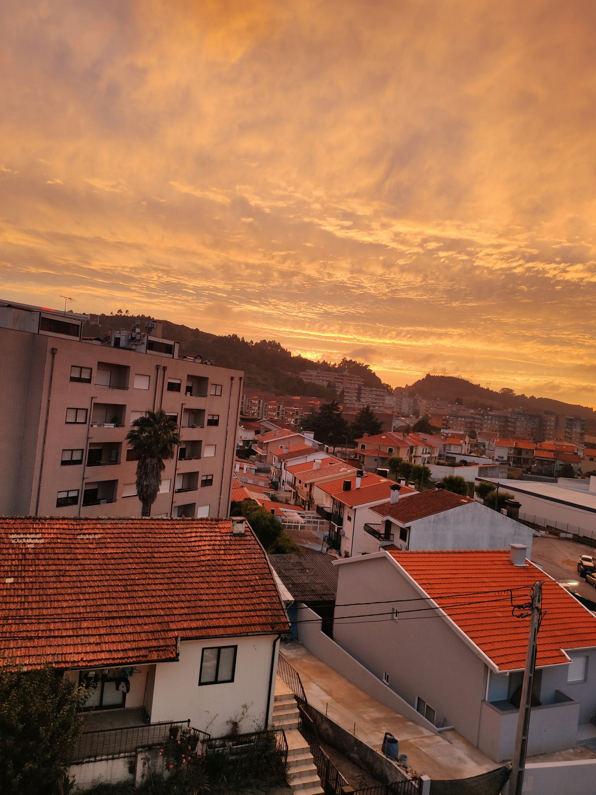 woman wearing yellow long-sleeved dress under white clouds and blue sky during daytime